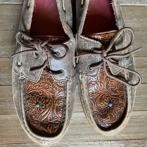 Twisted X driving Moccs tooled with turquoise